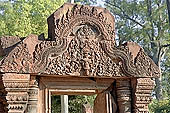 Banteay Srei temple - ancillary building of the causeway, Vishnou in the form of Narasimha holds upside-down Hiranya-Kasipu, the king of the Asuras